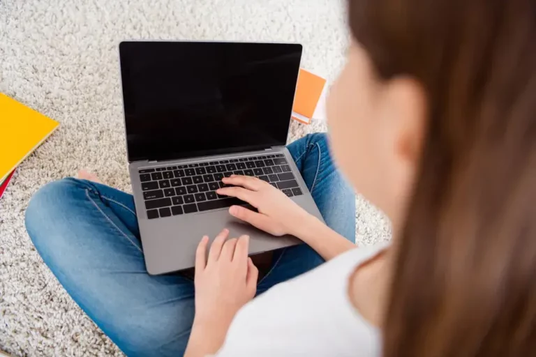 Girl sitting using a computer